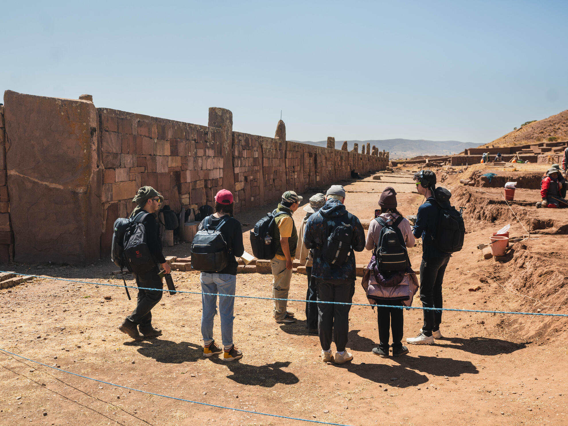 group of people in an archaeological site